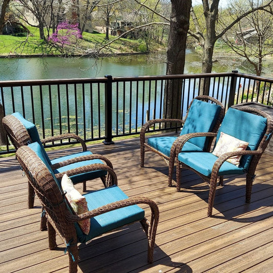 Beautiful Deck Railing atop a stair landing infront of lush green back yard the aluminum deck railing pictured is DekPro Prestige in Absolute Black