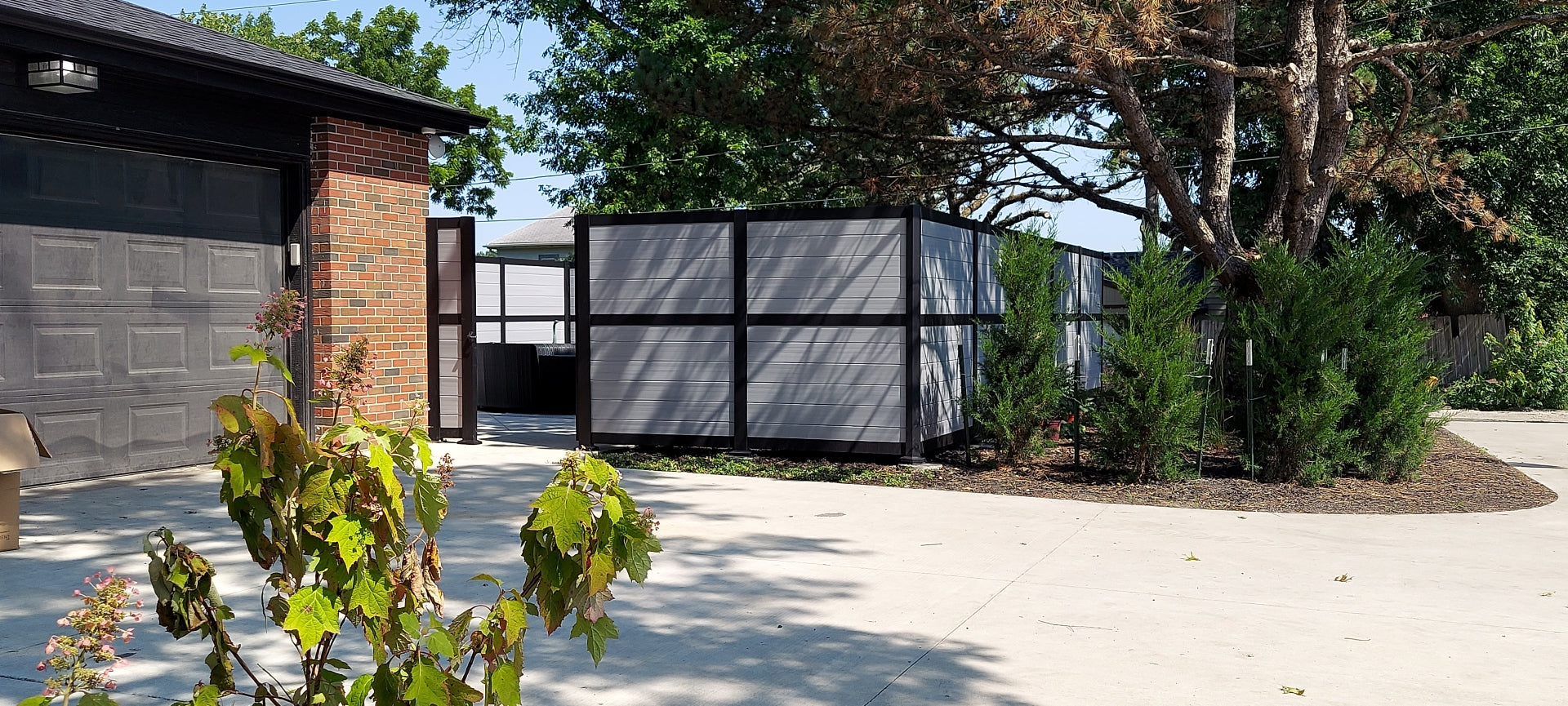 Privacy rail driftwood fence by rdi with gate gives a whole sepearate area of living