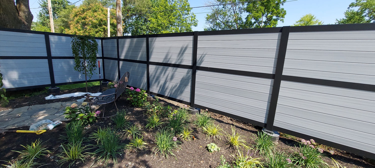 Outdoor private courtyard with the help of privacy fence in Driftwood by RDI