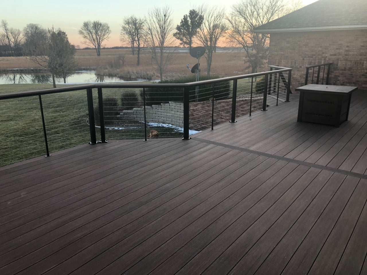 Feeney DesignRail Stainless Cable Railing System has single top rail under cable rail wire and pvc azek vintage decking