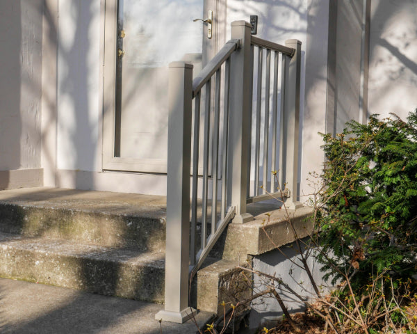 Dekpro Prestige Maple Cream handrail on concrete front of house stairs, matching the accent color of the house.