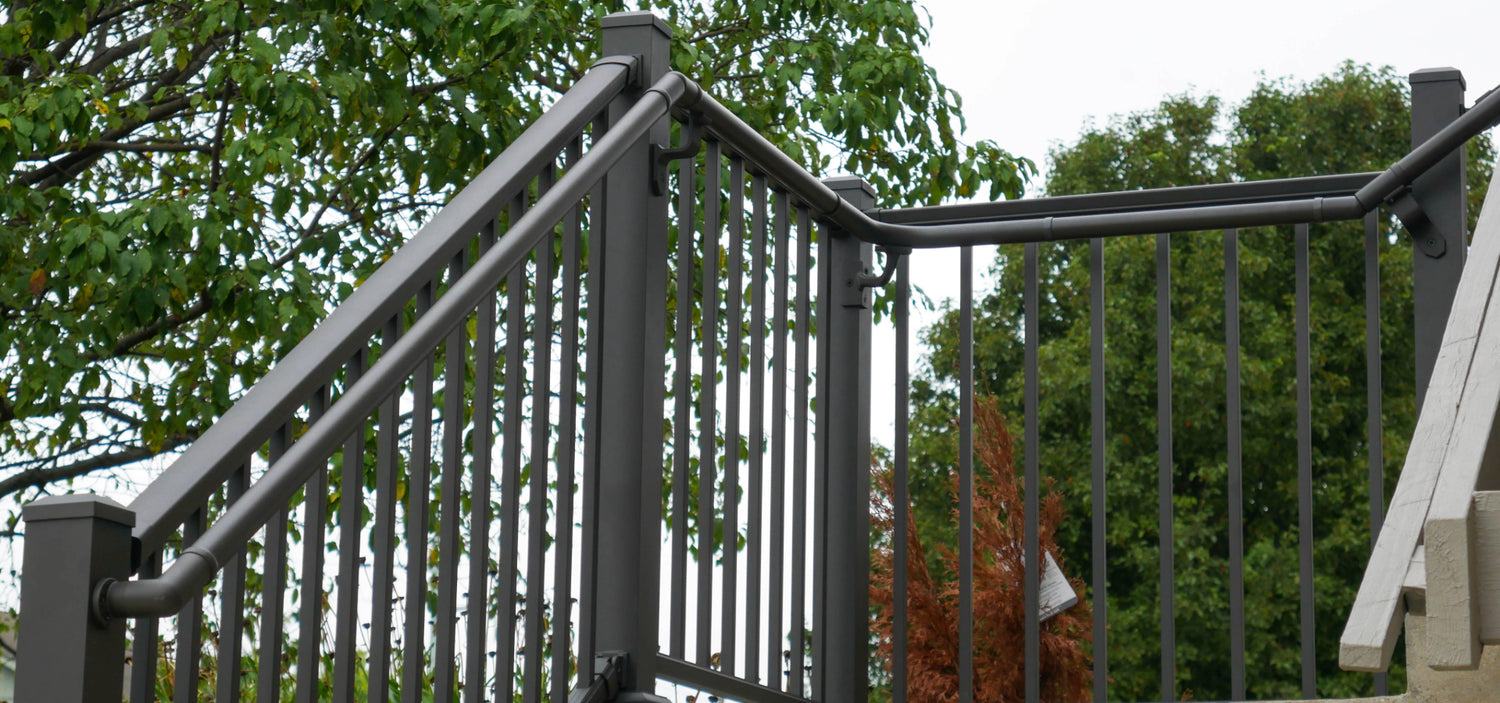 Bronze Aluminum Front Porch Handrail with side grab rail attached DekPro Prestige Railing and graspable handrail make for the best winter railing, very durable and easy to hold on to as you walk up the steps.