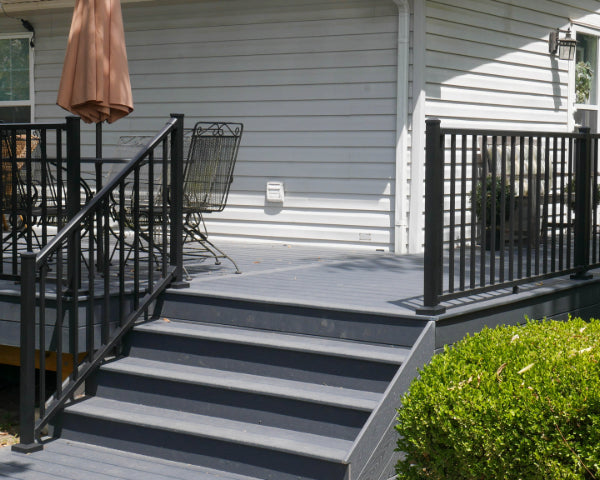 Back deck hang out with beautiful wide gray stairs and deck railing from the best westbury cten tuscany c10 railing in black tex