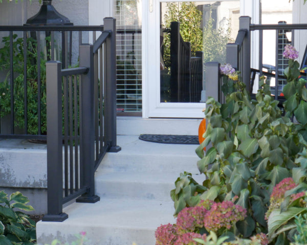 Step stair railing with landing and step up to stoop all accomplished with dekpro aluminum railing 