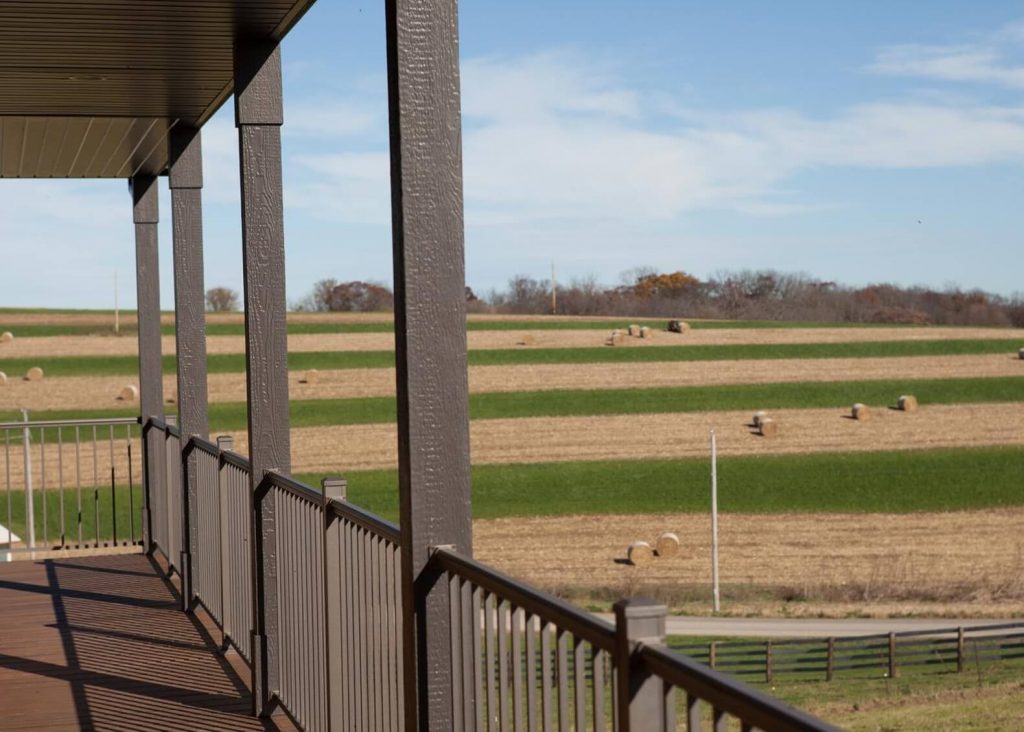 Outlook bronze aluminum railing with wide open view from slim rail profile photo credit: keylinonline.com