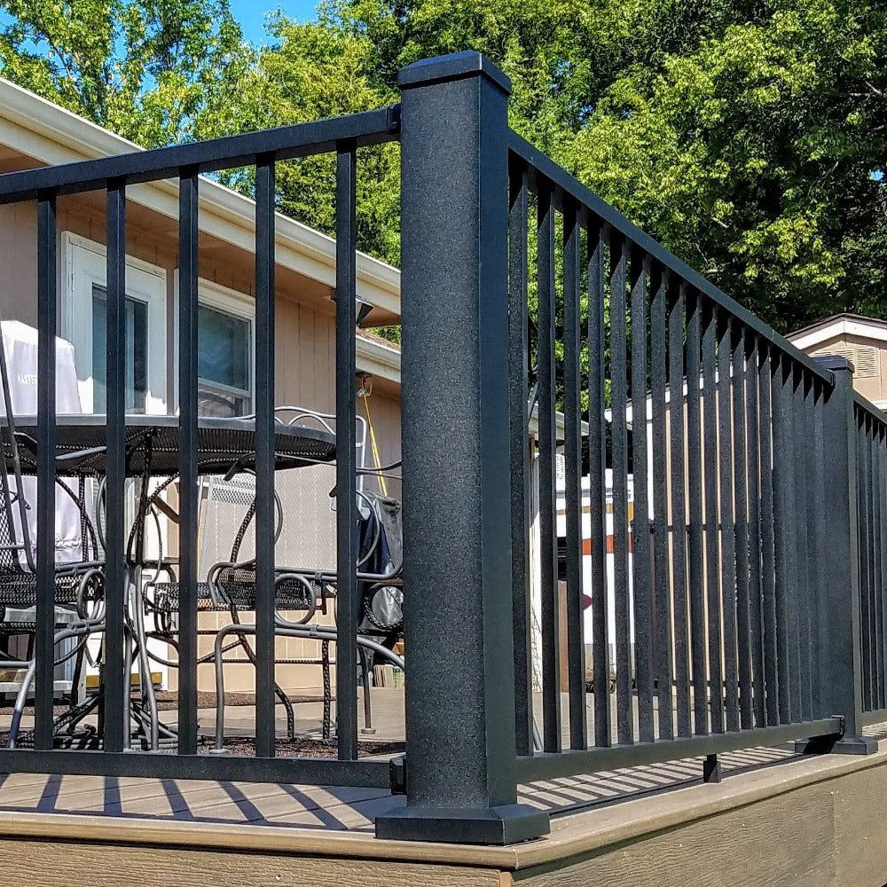 Black Four by four surface mounted aluminum westbury post kit with railing attached on two sides