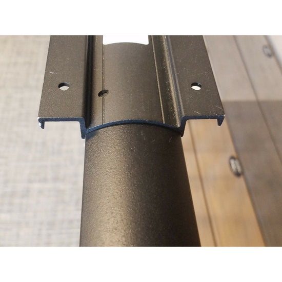 Drink rail adapter on top of a westbury rail in black fine texture, textured black, fine texture black