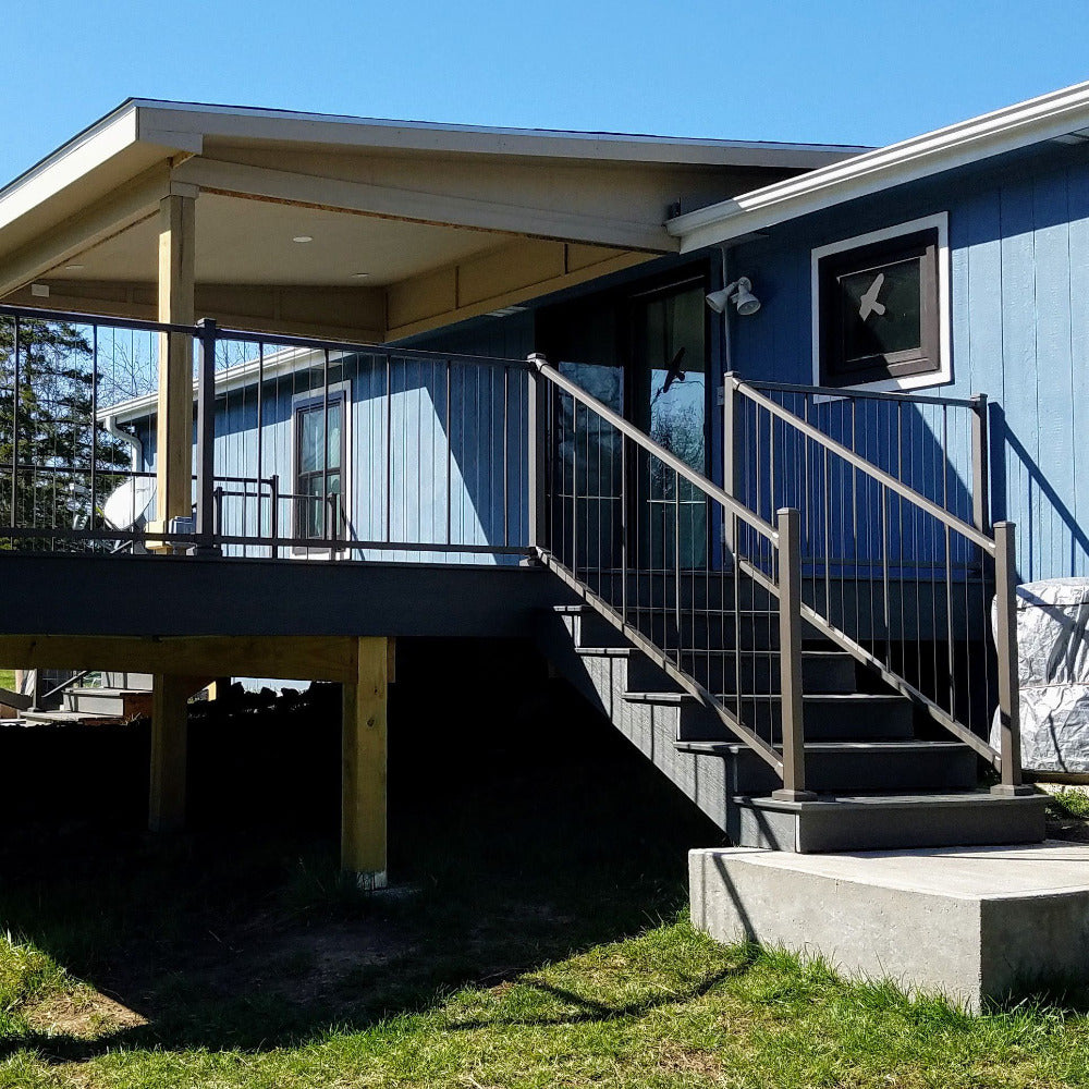 VertiCable Deck stairs and level rail on the back deck with a covered extended roof