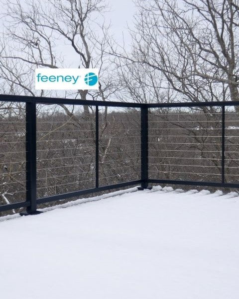 Feeney DesignRail Cable Railing corner on composite pvc deck holding in the snow