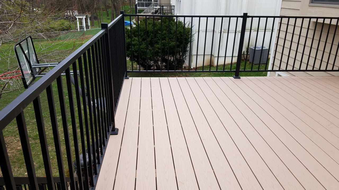 Fe26 Iron by Fortress Railing Products Iron railing type rail solid welded iron powder coated and heavy. Is a great priced railing option but needs to be maintained with paint to preserve logevity