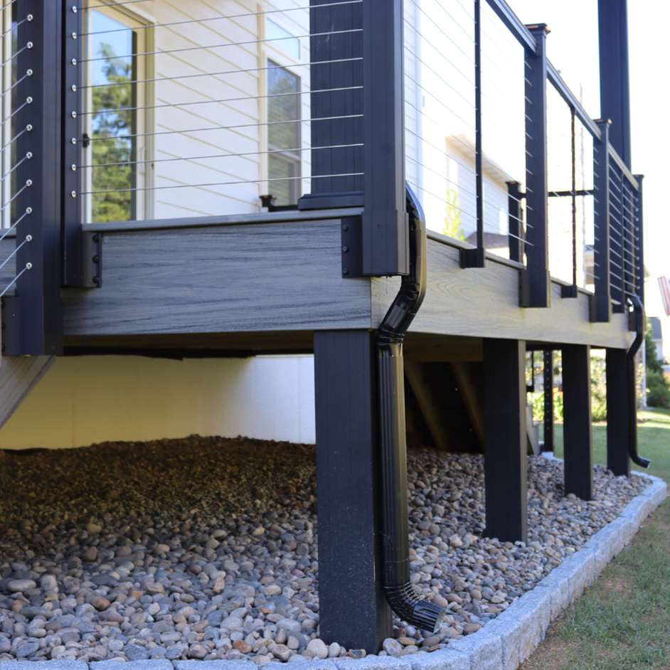 KeyLink Outside Corner Fascia Mount Bracket, Line Bracket, and Intermediate Baluster Fascia Bracket shown with horizontal KeyLink Cable Railing