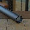KeyLink's ADA round handrail in textured black blends in with KeyLink, and stands out against concrete and deck walls.
