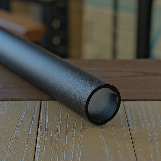 KeyLink's ADA round handrail in textured black blends in with KeyLink, and stands out against concrete and deck walls.