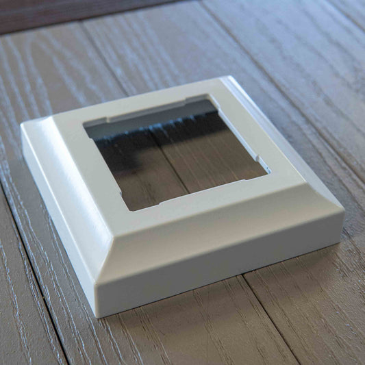 A square white metal aluminum post base cover or post flair, or post skirt made to fit KeyLink 2.5" x 2.5" posts. 