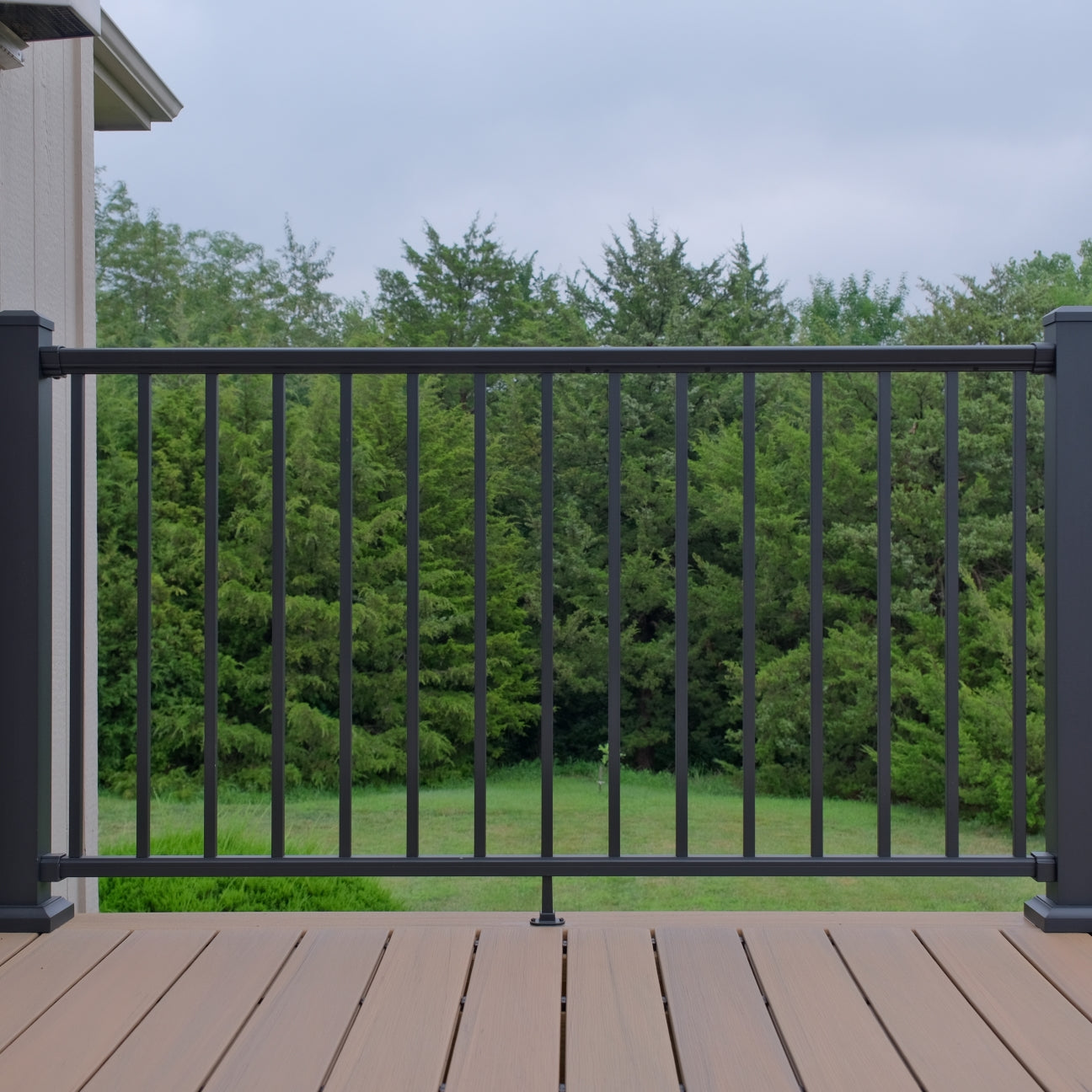 Dekpro Prestige aluminum level handrail kit installed on a composite deck.