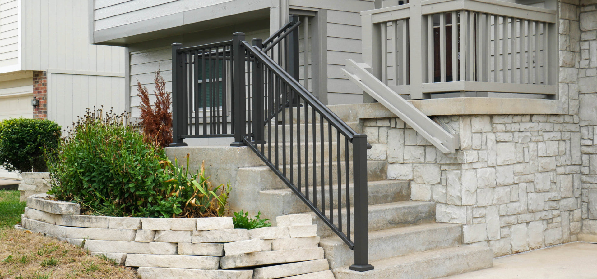 Bronze Aluminum Front Porch Handrail with side grab rail attached DekPro Prestige Railing and graspable handrail make for the best winter railing, very durable and easy to hold on to as you walk up the steps.