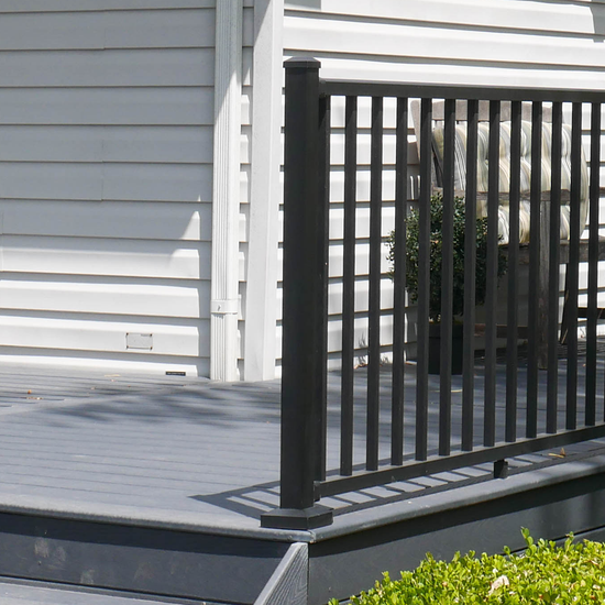 37" Westbury Textured Black aluminum handrail level post on a deck.