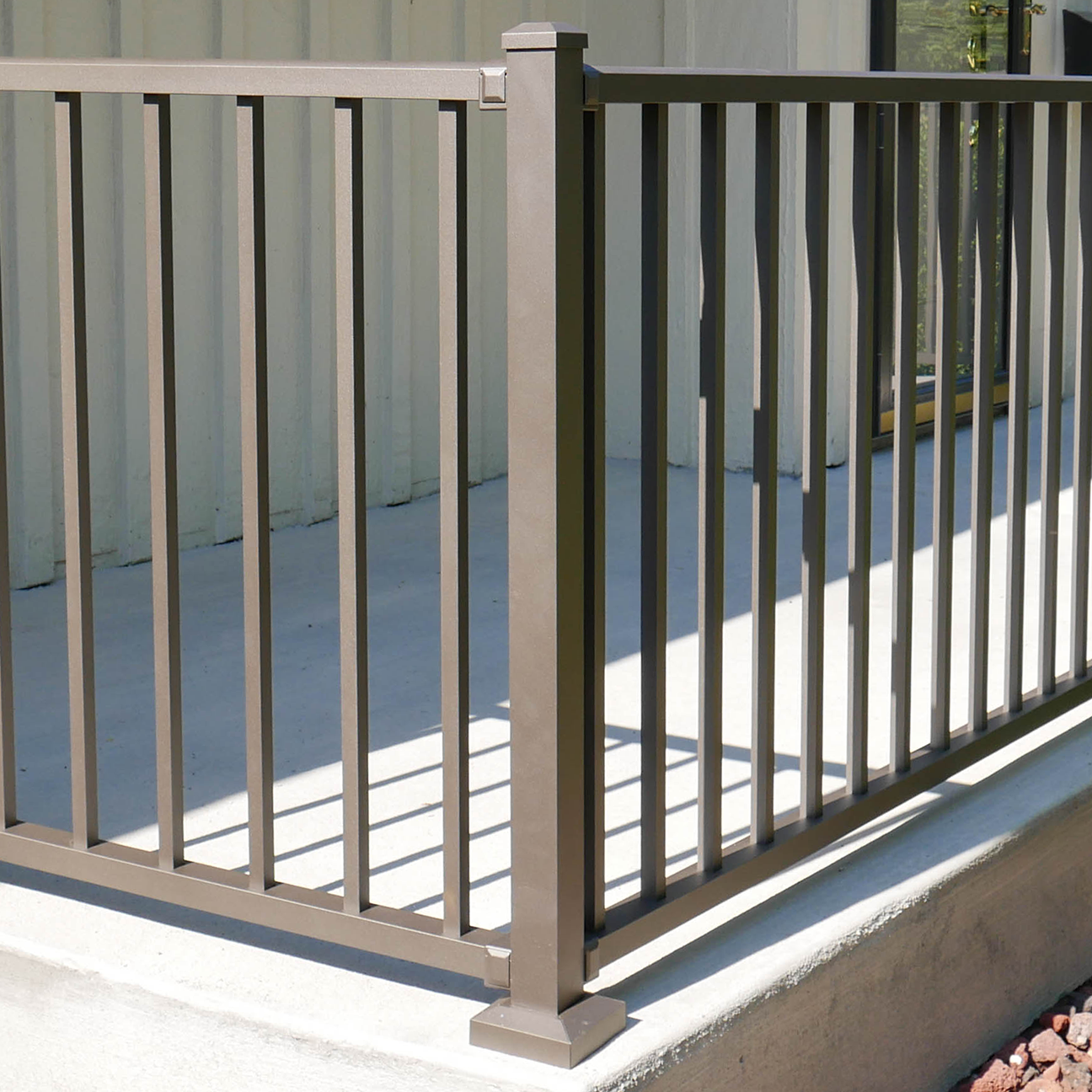 Westbury Textured Bronze level aluminum handrail corner post.
