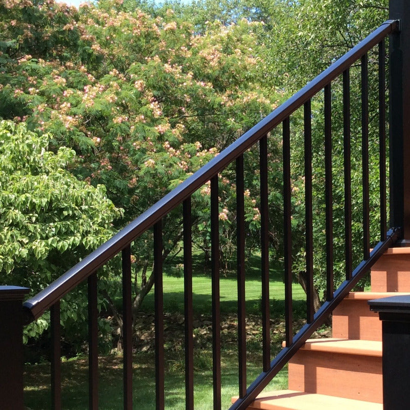 DekPro Stair Railing on PVC Decking Azek Cypress The aluminum hand rail has a beutiful green backdrop in may